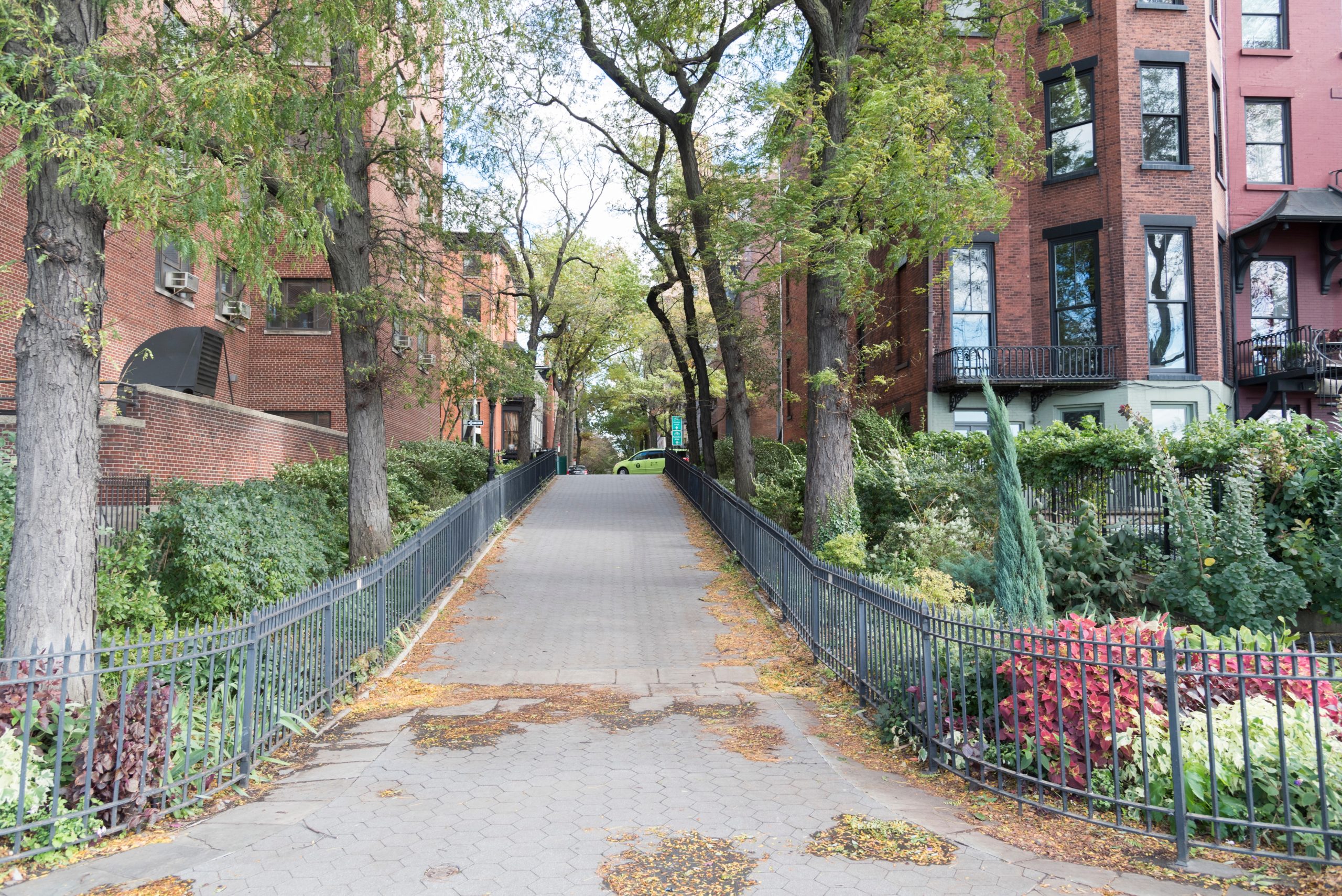 https://ekacontracting.com/wp-content/uploads/2015/05/manicured-neighborhood-brownstones-2022-11-14-06-51-41-utc-scaled.jpg